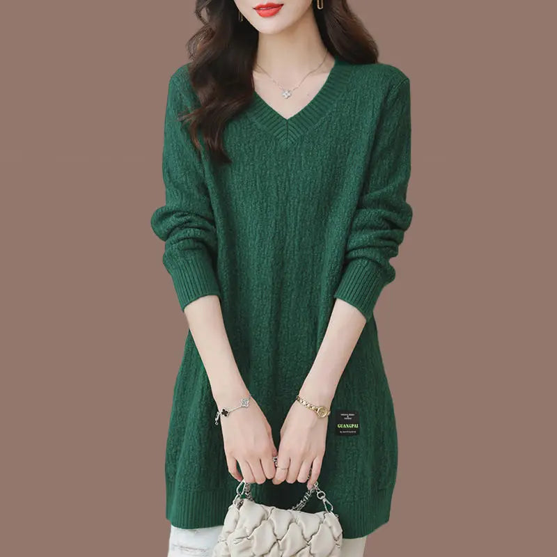 Women's knit sweater with V-neck, mid-length.