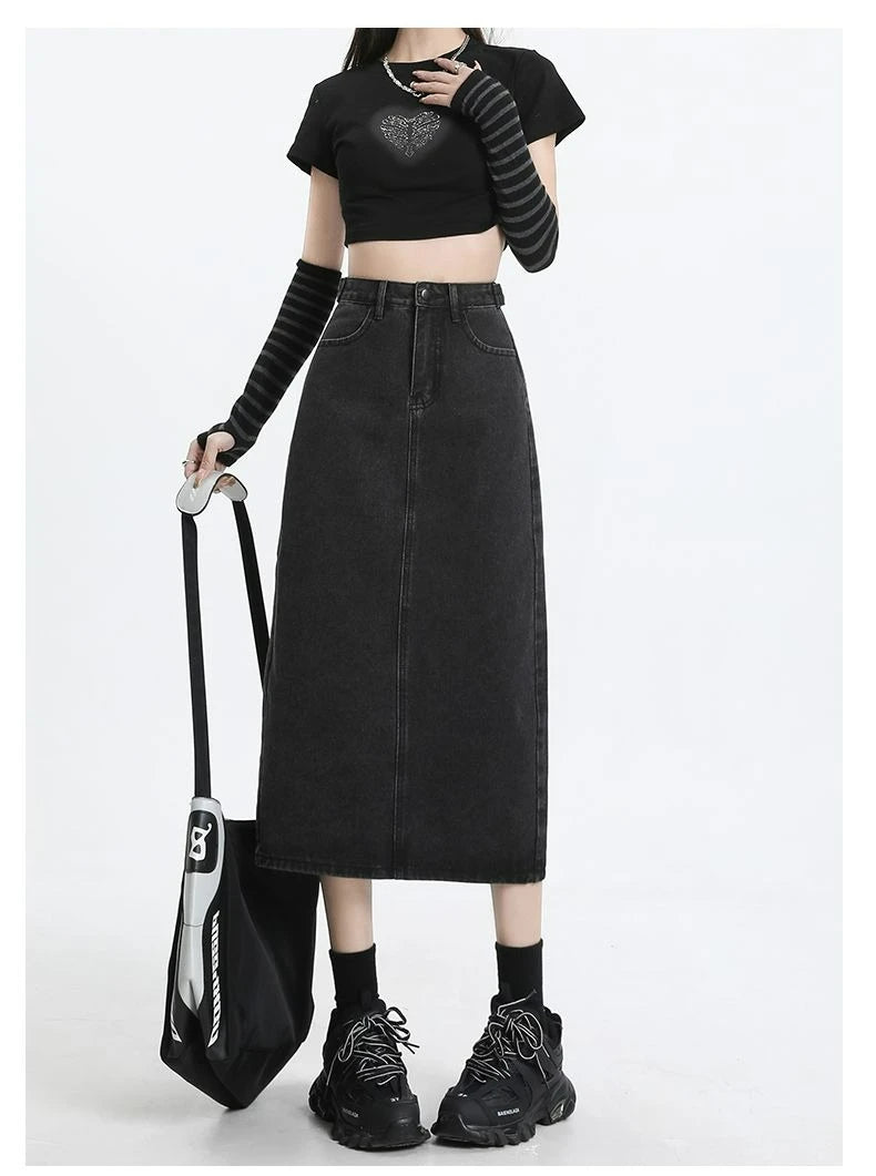 Retro women's denim dress with a high waist and slimming effect.