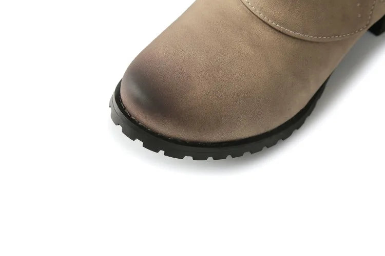 ZawsThia Winter women's military-style boot with buckle and low chunky heel.