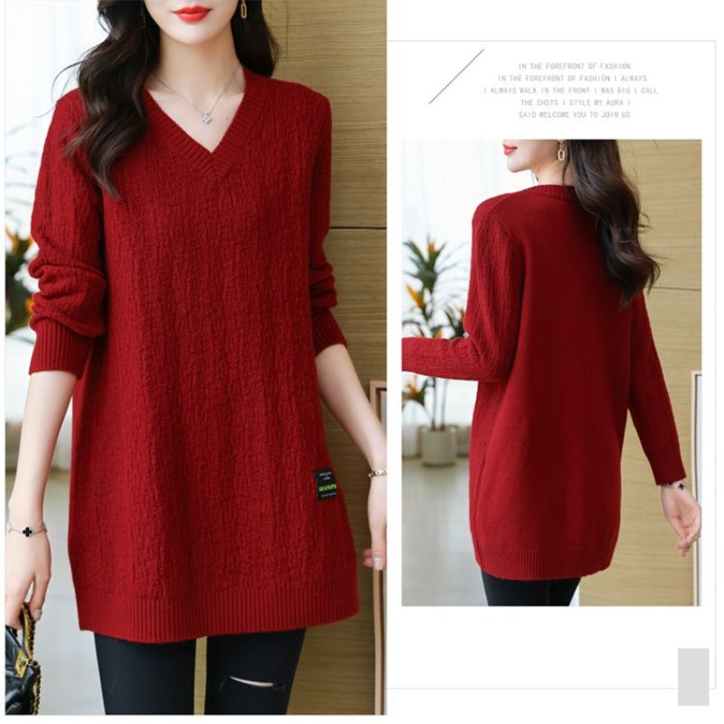 Women's knit sweater with V-neck, mid-length.