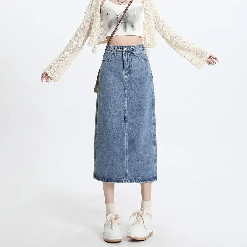 Retro women's denim dress with a high waist and slimming effect.