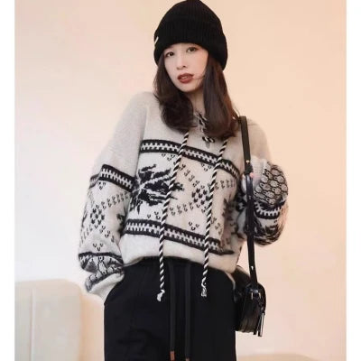 Women's sweater made of 100% wool and cashmere.