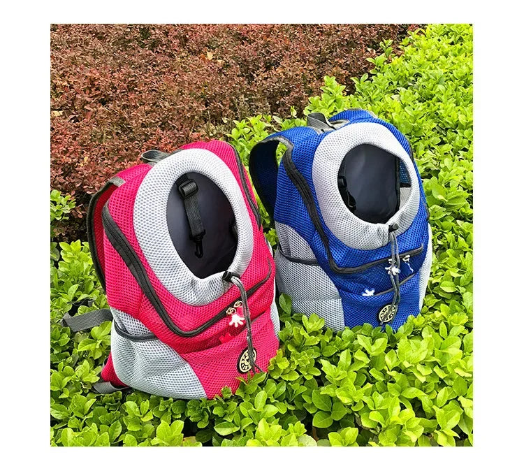 Portable travel backpack with double handles for pets.