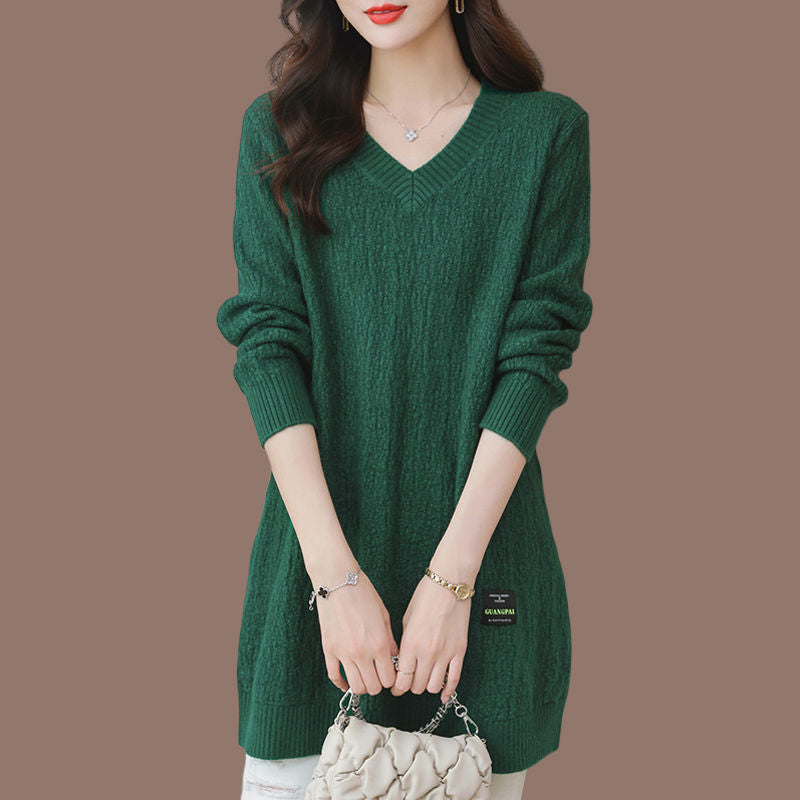 Women's knit sweater with V-neck, mid-length.